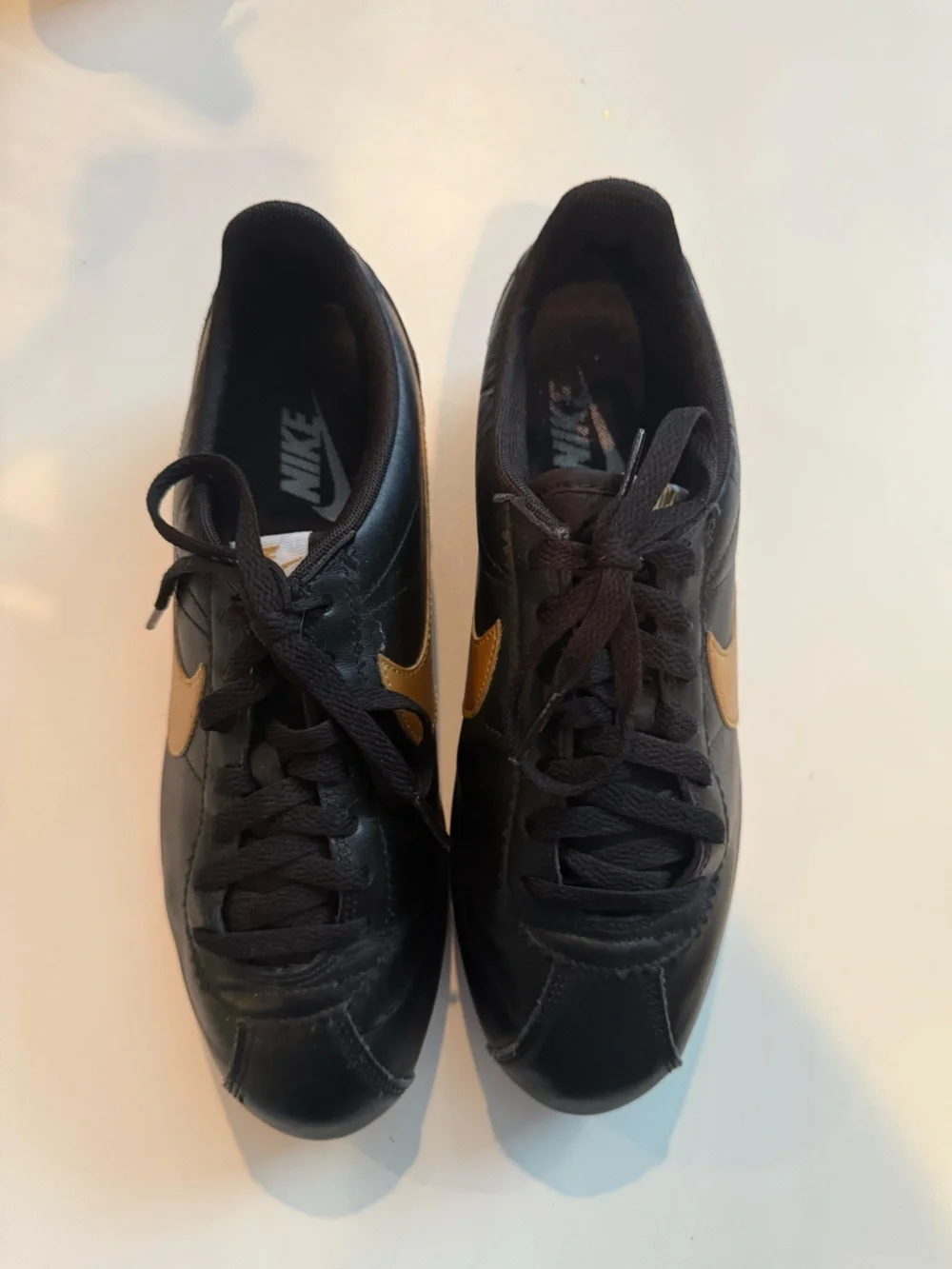 Nike Woman’s Cortez Black & Gold Size 9.5 Like New
